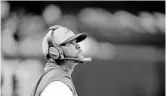  ?? BUTCH DILL/AP ?? Dolphins coach Brian Flores looks up at the scoreboard during the second half of Monday’s game in New Orleans.