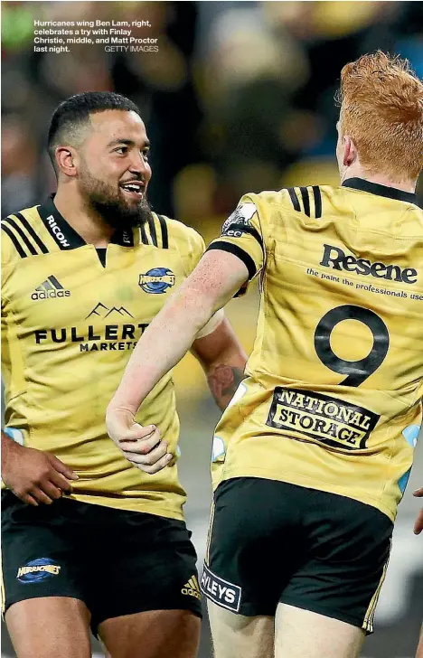  ??  ?? Hurricanes wing Ben Lam, right, celebrates a try with Finlay Christie, middle, and Matt Proctor last night.