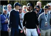  ?? ?? Jordan Spieth talks to musician Jake Owen on the 11th hole during the second round of the AT&T Pebble Beach Pro-Am at Spyglass Hill Golf Course.