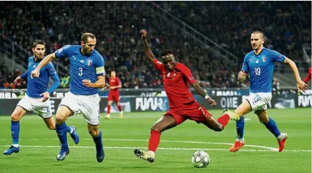  ?? — Reuters ?? Firing blanks: Portugal’s Bruma (second from right) rifling a shot in the UEFA Nations League match against Italy at the San Siro on Saturday.