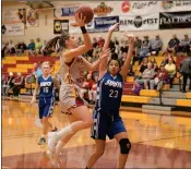  ?? COURTESY OF ARIZONA WESTERN COLLEGE ?? AWC FORWARD Mar Ibern goes up for a layup over South Mountain’s Kaylah Burrows in the Mats’ 53-51 loss on Wednesday night at home.