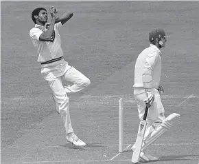  ??  ?? Perfect and predatory: Michael Holding bowling for the West Indies