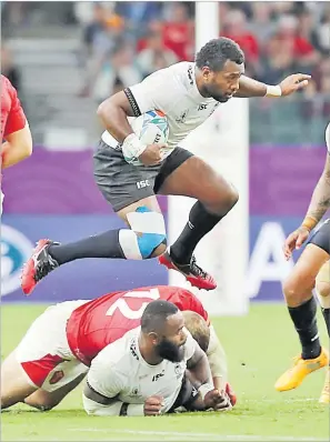  ?? Picture: JOVESA NAISUA ?? Flying Fijians full back Kini Murimuriva­lu in action against Wales during their pool match at the Oita Stadium in Oita, Japan.