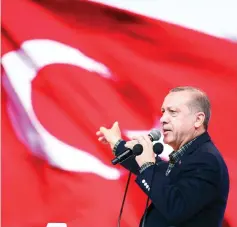  ??  ?? This handout photo taken and released by the Turkish Presidenti­al Press Service shows Erdogan addressing the crowd at the Yahya Kemal Beyatli Show Center in Istanbul, during an event organised for the people of Tokat. — AFP photo