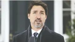  ?? DAVE CHAN / AFP via Gett
y Imag
es files ?? If you could pin Prime Minister Justin Trudeau down he might admit there’s no pain-free solution to COVID-19,
writes John Robson. But you can’t.