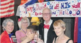  ?? PHOTO: JARED MORGAN ?? Toasting Trump’s toppling . . . Raising a glass to President Donald Trump’s defeat in the US election are (from left) Suzanne Russell, of Clyde, Marilyn and Timothy Fleming, and Nola Hambleton, all of Alexandra.