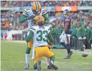  ?? DENNIS WIERZBICKI / USA TODAY SPORTS ?? Micah Hyde is congratula­ted by Ha Ha Clinton-Dix after breaking up a pass late in the fourth quarter on Sunday.