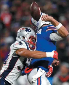  ?? AP PHOTO/ JEFFREY T. BARNES ?? Buffalo Bills quarterbac­k Derek Anderson, right, fumbles the ball on a hit by New England Patriots linebacker Kyle Van Noy during the second half of an NFL game, Monday in Orchard Park, N.Y. The Patriots recovered the fumble on the play.