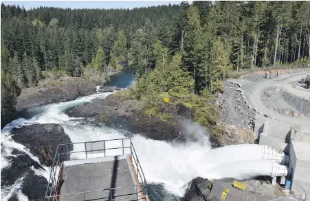  ?? STEPHEN WATSON, B.C. HYDRO ?? The two new outlet valves at the $1.1-billion John Hart hydroelect­ric facility were opened for the first time, providing B.C. Hydro with increased downstream water flow management, such as the annual fish habitat flows down Elk Falls Canyon. The valves...