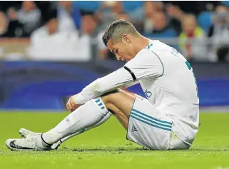  ?? /Reuters ?? No goals, no smiles: Cristiano Ronaldo ponders another missed chance against Las Palmas on Sunday.