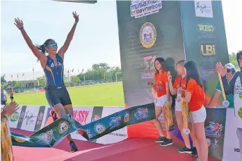  ?? NOEL BAGUIO ?? TOP WOMAN. Ma. Claire Adorna dominated the Elite Female category in the 2nd MusaMan TriDavNor triathlon on Sunday.