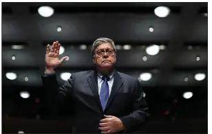  ?? (AP/Chip Somodevill­a) ?? William Barr is sworn in Tuesday for a House Judiciary Committee hearing, his first before the panel in his 18 months as attorney general, time in which Barr has taken actions supported by President Donald Trump but condemned by Democrats and other critics.