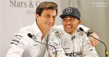  ??  ?? Toto Wolff (left) and Lewis Hamilton