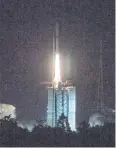  ?? AP ?? The Long March-4C rocket carrying the relay satellite Queqiao lifts off.