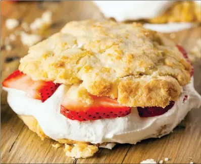  ?? TRIBUNE CONTENT AGENCY ?? Sweet biscuits provide a perfect canvas for the strawberri­es.