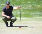  ?? ASSOCIATED PRESS FILE PHOTO ?? Jason Day lines up a putt on the eighth green during the third round of the Arnold Palmer Invitation­al in Orlando, Fla., in March.