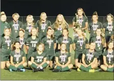  ?? KEV HUNTER/MEDIANEWS GROUP ?? Members of the Dock girls soccer team pose with the District 1-A trophy after its victory over Calvary Christian on Thursday.