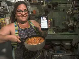  ?? — Photos: AP ?? Colon, a contributo­r to the Facebook group page, ‘Recipes From The Heart’, showing off her dish. Contributo­rs to the page will sometimes list alternativ­e ingredient­s that can be used in their recipes.