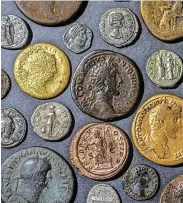  ?? ?? Dr Philippa Walton and coins found at Piercebrid­ge