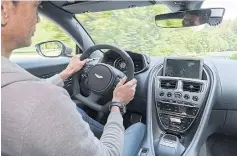  ??  ?? Suede-rimmed steering wheel and seats are nice touches in both visual and tactile terms.