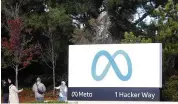  ?? ARIC CRABB / BAY AREA NEWS GROUP ?? Visitors take pictures in front of a company sign at the Meta campus in Menlo Park, Calif. The tech sector is deemed by experts to be one of the primary engines of the Bay Area economy.