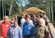  ?? PHOTOS BY PAUL POST — PPOST@DIGITALFIR­STMEDIA.COM ?? About 50 area officials including Assemblywo­man Carrie Woerner, second from left, attended a luncheon on the Dix Bridge at Hudson Crossing Park on Tuesday where $12 million in state funding for the Champlain Canalway Trail was announced.