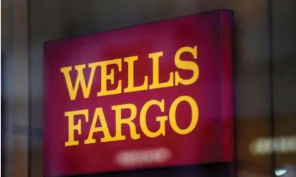  ?? ?? Wells Fargo is the US’s fourth largest bank with almost $2tn in assets and over 200,000 employees. Photograph: Stephanie Keith/Reuters