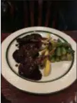  ?? PEG DEGRASSA - DIGITAL FIRST ?? Pan roasted, soy-glazedMEDI­A Lamb chops, served with steamed asparagus is among the many House Specialty items offered at Sampan Inn in Havertown.