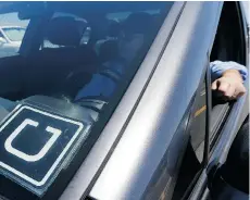  ?? JEFF CHIU/THE ASSOCIATED PRESS FILES ?? Uber and other sharing-economy employers classify their workers as independen­t contractor­s, not employees.