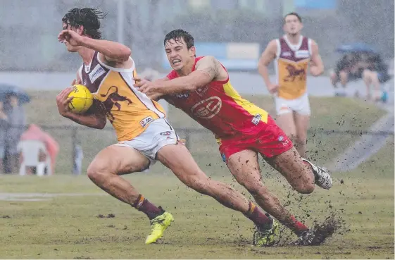  ?? Picture: MIKE BATTERHAM ?? The Suns and Lions left a mark at Fankhauser Reserve thanks to some tough conditions.