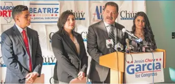  ??  ?? Cook County Commission­er and Congress candidate Jesus “Chuy” Garcia ( at podium) introduces a slate of three progressiv­e Latino candidates ( from left) Aaron Ortiz, Beatriz Frausto- Sandoval and Alma Anaya on Thursday.
| MAX HERMAN/ FOR THE SUN- TIMES