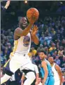  ?? EZRA SHAW / GETTY
IMAGES / AFP ?? Draymond Green goes up for a shot in Monday’s triple-double performanc­e against the Hornets.