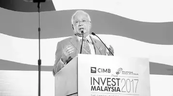  ??  ?? Najib delivers his keynote address at Invest Malaysia 2017 yesterday. — Bernama photo