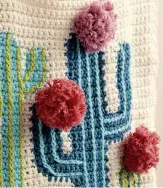  ??  ?? Pompom ‘flowers’ are fun and add textured detail to the cactus design