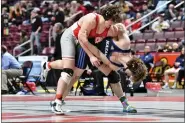  ?? AUSTIN HERTZOG - MEDIANEWS GROUP ?? Owen J. Roberts’ Dillon Bechtold battles with Nazareth’s Sonny Sasso in the 215-pound final at the PIAA Wrestling Championsh­ips on March 11 at Giant Center in Hershey.