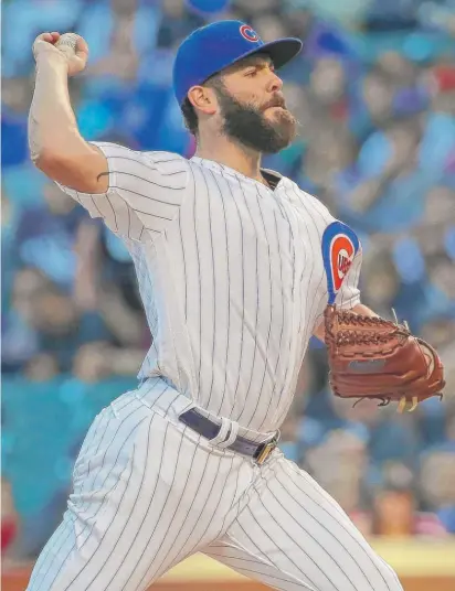  ?? | GETTY IMAGES ?? Jake Arrieta allowed two runs, struck out five and walked three in six- plus innings Tuesday against the Marlins.