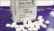  ?? Toby Talbot / Associated Press file photo ?? OxyContin pills arranged for a photo at a pharmacy in Montpelier, Vt. in February.