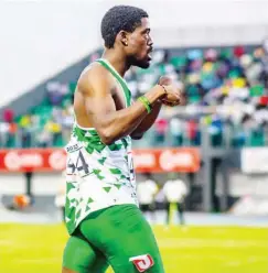  ?? ?? Chidi Okezie celebrates after his victory in men’s 400m