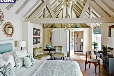  ?? ?? FARMHOUSE FEEL: A bedroom at Dormy House. Below: Fine dining on the Farncombe Estate