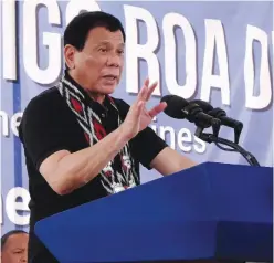  ??  ?? PHILIPPINE­S: This picture shows, Philippine’s President Rodrigo Duterte gesturing as he delivers a speech during inaugurati­on the M’lang Solar Powered Irrigation System in Barangay Janiuay, M’lang, North Cotabato on the southern Philippine island of...