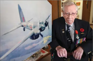  ?? GARY NYLANDER/The Okanagan Weekend ?? F/Lt. Albert Richard (Dick) Sanderson fought the Nazis by flying Mosquito fighter-bombers and Boston A-20s over occupied France in 1943-44. Now 96 and living with his wife Bernice in Kelowna, he received an award from France last year.