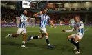  ?? Photograph: John Early/Getty Images ?? Jonathan Hogg celebrates after scoring Huddersfie­ld’s third at Bloomfield Road.