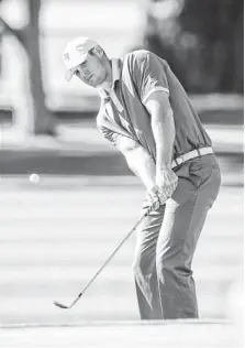  ?? MICHAEL SCHENNUM/AZCENTRAL SPORTS ?? Air Force Academy golfer Kyle Westmorela­nd hits onto the green Tuesday on the fourth hole at the Patriot All-America Invitation­al at the Wigwam Resort in Litchfield Park.