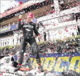  ?? AP ?? Will Power celebrates a win in the Pocono IndyCar 500 on Monday. Surging in the standings, he trails series leader Simon Pagenaud by 20 points with three races left.