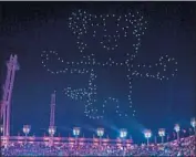  ?? Martin Bernetti AFP/Getty Images ?? 5G technology was used at the Winter Olympics in South Korea to direct drones that put on a light show.