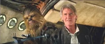  ?? — Film Frame/ Lucasfilm ?? Chewbacca (Mayhew) and Han Solo (Ford) in ‘Star Wars: The Force Awakens’.