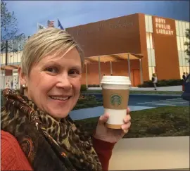  ?? PHOTO COURTESY OF NOVI PUBLIC LIBRARY ?? Novi Public Library is one of 50local libraries that offers a digital collection through Download Destinatio­n. Library Director Julie Farkas is pictured outside the library.