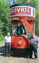  ??  ?? Stockport tram No. 5 is launched into service: Left to right are Phillip Heywood, Manchester Transport Museum Society chairman, Pete Waterman at the controls, and Keith Whitmore, chairman of the Manchester Tramway Museum Company. PAUL ABELL