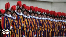  ?? ?? The Pope's army: The Swiss Guard are an elite military corps — and yes, they have to be Swiss citizens