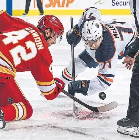  ?? BRETT HOLMES GETTY IMAGES FILE PHOTO ?? Ryan McLeod, right, and the Oilers will face off against the Flames starting Wednesday in Calgary. It marks the first time in 31 years the teams have battled in the post-season.